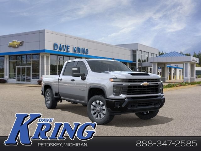 2026 Chevrolet Silverado 2500 HD Custom in Sterling Gray Metallic — front three-quarter view