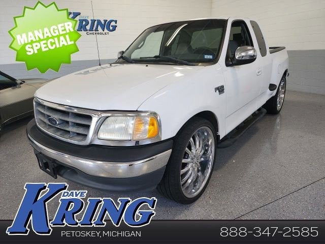2001 Ford F-150 XL in White — front three-quarter view